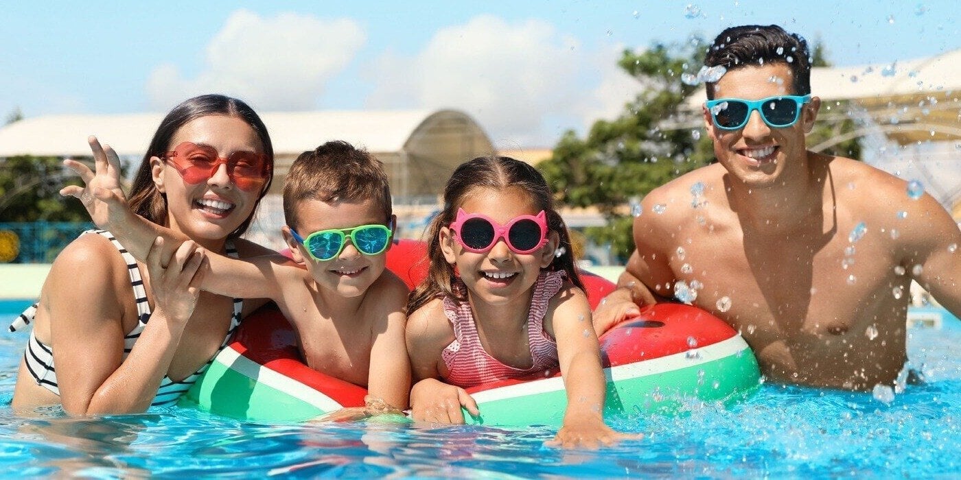 family enjoying pool time together