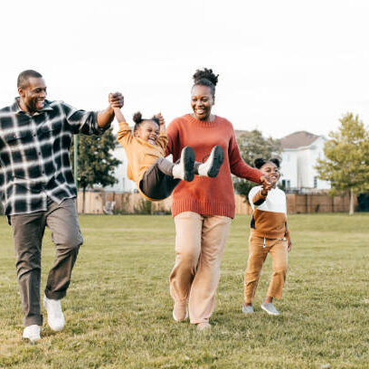 family having fun on soccer field while we handle the home cleaning services in Berkeley, CA